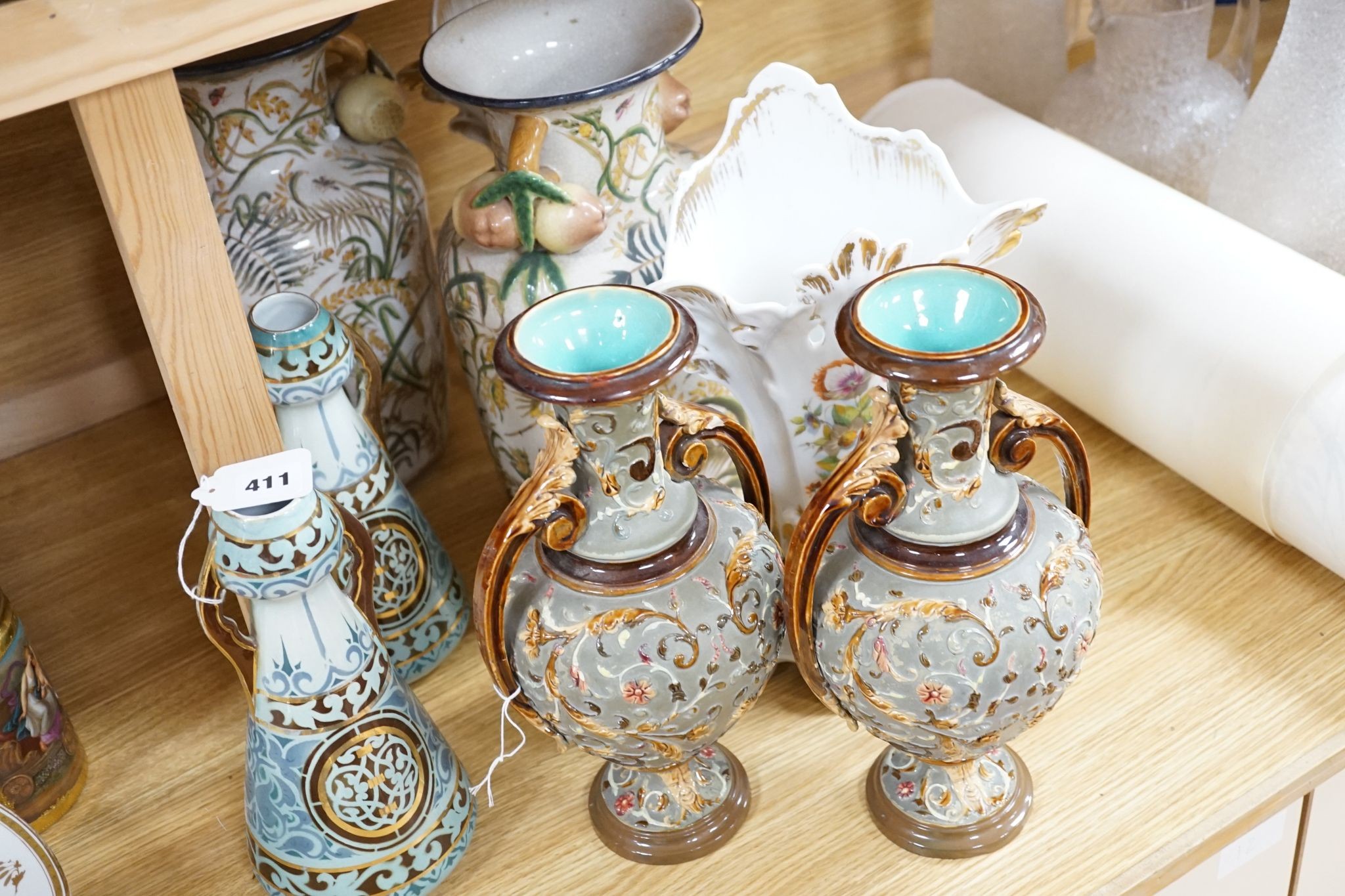 Four pairs of continental porcelain vases including a pair of Wilhelm Schiller & Sons vases